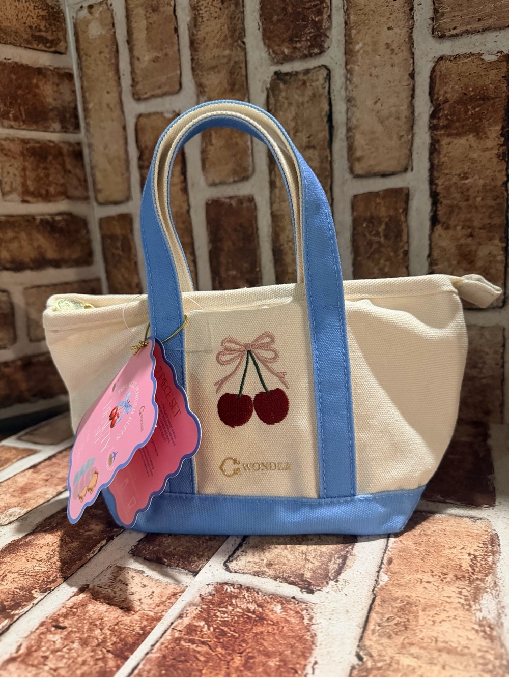 Cream Canvas Tote with Light Blue Trim and Cherry Embroidery by C. Wonder